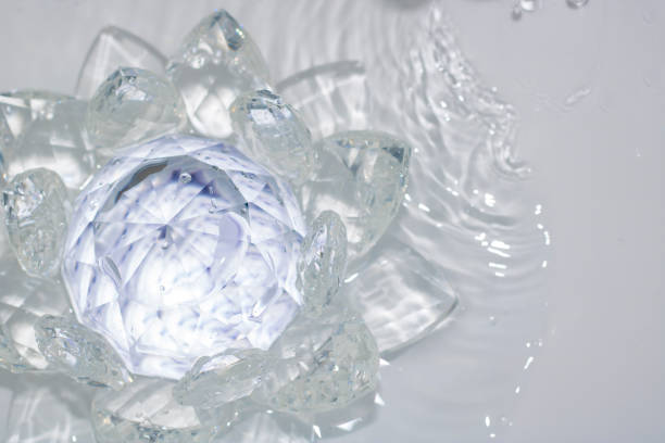 istock lotus-shaped crystal over water 970527554