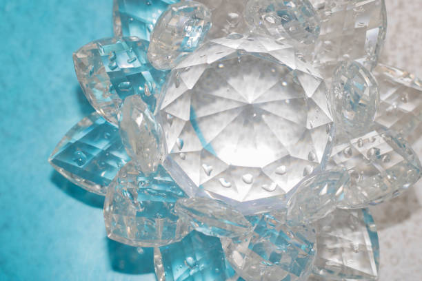 istock lotus-shaped crystal over water 970527562