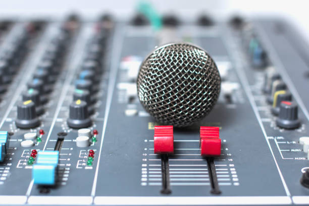istock Slide the volume control of the audio mixer. 970536562