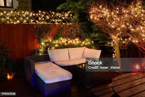 Illuminated Garden Seating And Fairy Lights Stock Photo - Download Image Now - Christmas Lights, String Light, Outdoors