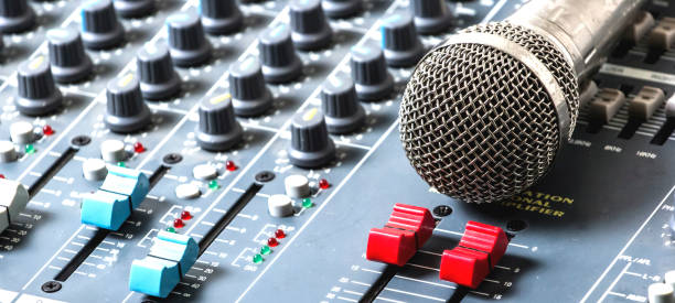 istock Microphones and mixers on the table. 970542666