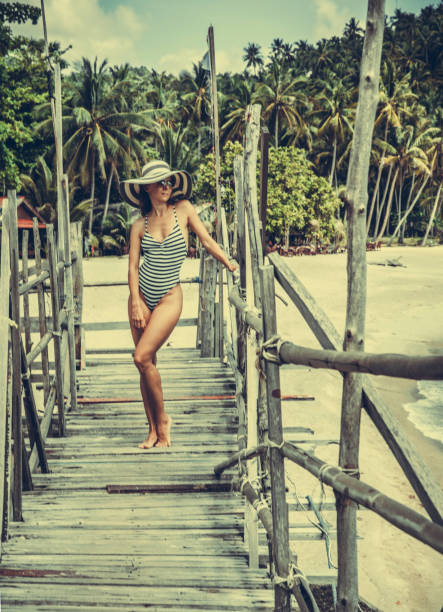 istock Woman posing on the beach 970542772