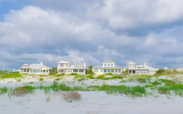A row of vacation cottages in the sand dunes in St. Augustine, Florida.