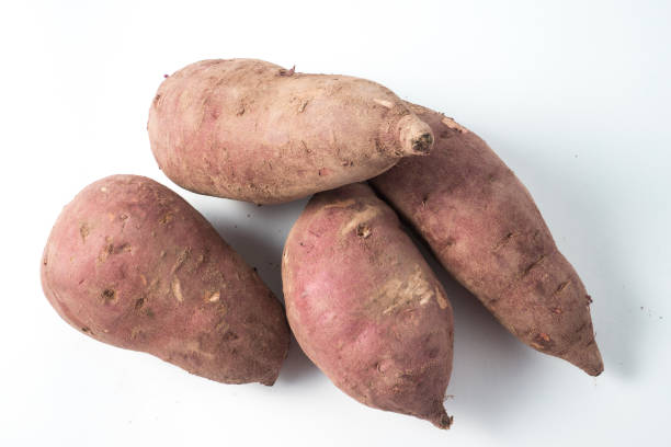 istock sweet potato on the white background 970593734