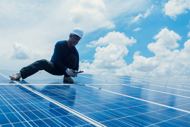 istock engineer team working on replacement solar panel in solar power plant;engineer and electrician team swapping and install solar panel ; electrician team checking hot spot on break panel 970596350