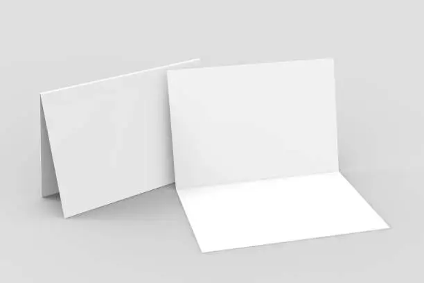 Photo of Half-fold horizontal brochure blank white template for mock up and presentation design. 3d illustration.