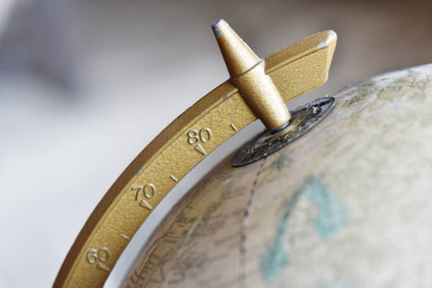 istock Top of old antique globe with latitude measurement 970624562