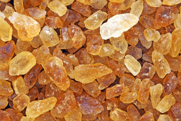 istock close up brown rock sugar crystal for background texture 970631078