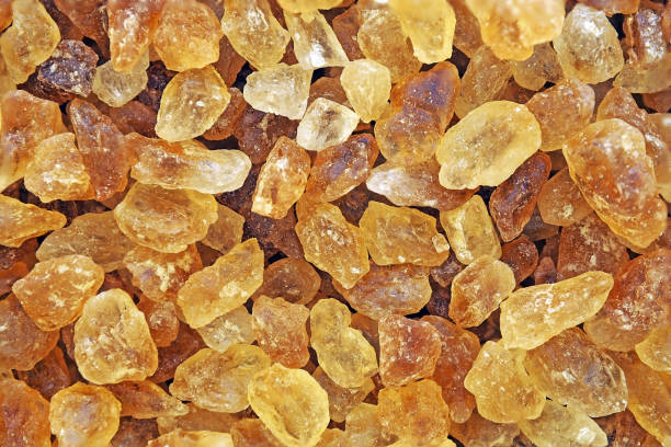 istock close up brown rock sugar crystal for background texture 970633114