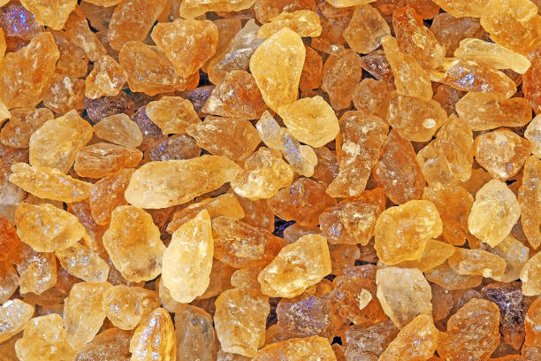 istock close up brown rock sugar crystal for background texture 970635192