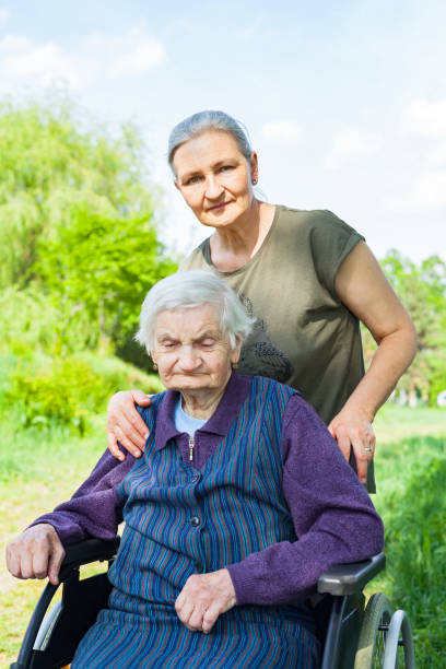 istock Mother & daughter in the park 970639378