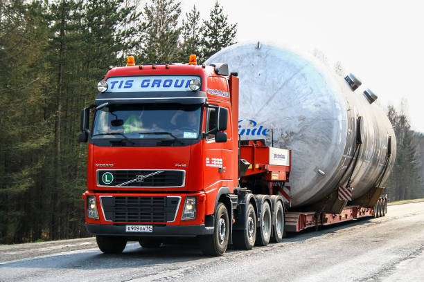 Chelyabinsk region, Russia - May 9, 2011: Red semi-trailer truck Volvo FH16.660 at the interurban road.