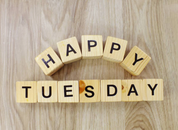istock happy tuesday letter wooden alphabet top view 970646954