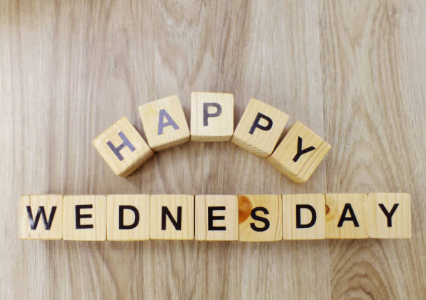 istock happy wednesday letter wooden alphabet top view 970647236