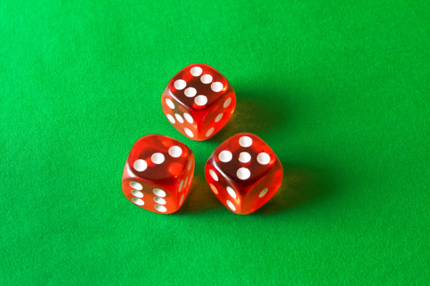 istock Dice on a green background . Game concept. Games of chance 970658600
