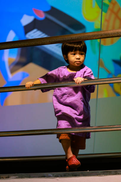 istock little boy is stand alone and looking at something with confuse on his face 970668276