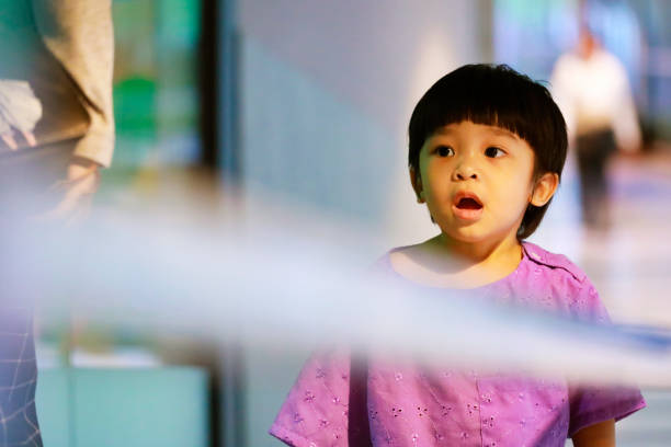istock little boy mouth open looking surprised on his face 970669028