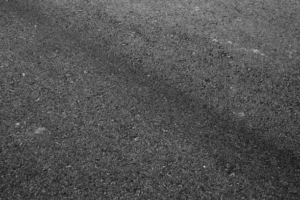istock black asphalt texture. asphalt road. stone asphalt texture background black granite gravel 970686428