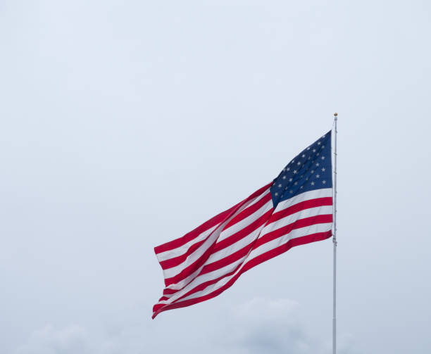 istock An American Flag Flying on a Breezy Day 970686692