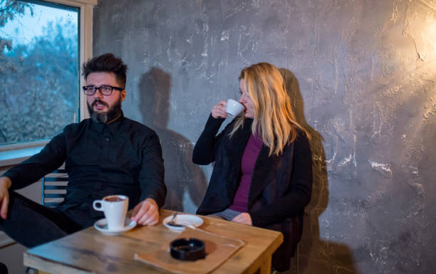 istock Romantic couple dating in pub at night 970700098