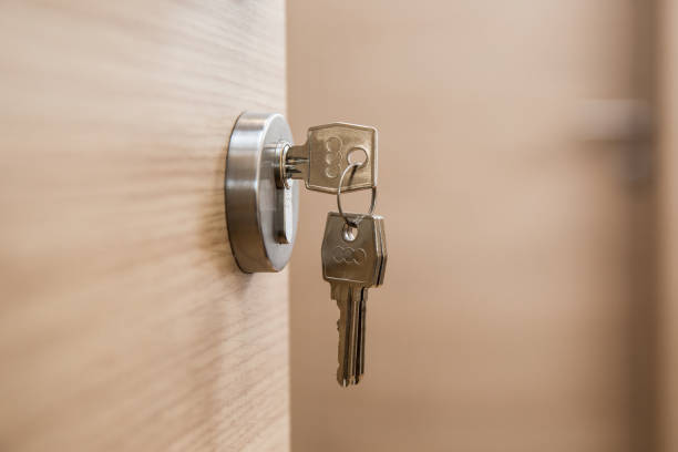 istock door with a key to the new apartment 970736556