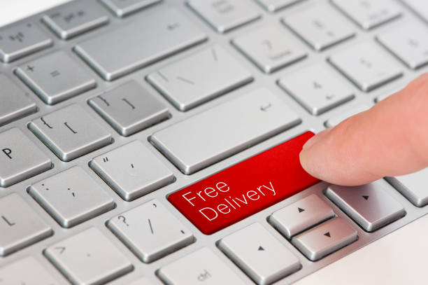 istock A finger press red free delivery button on laptop keyboard 970739458