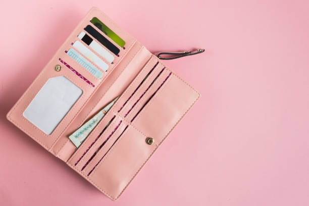 istock Open female pink wallet. Flat lay. Copy space. 970744152