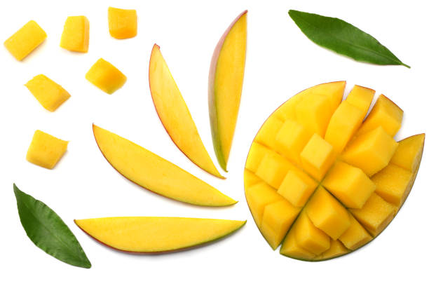 istock mango slice with green leaves isolated on white background. top view 970761258