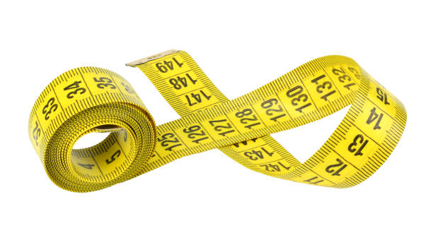 istock Yellow measuring tape isolated on white background 970761426