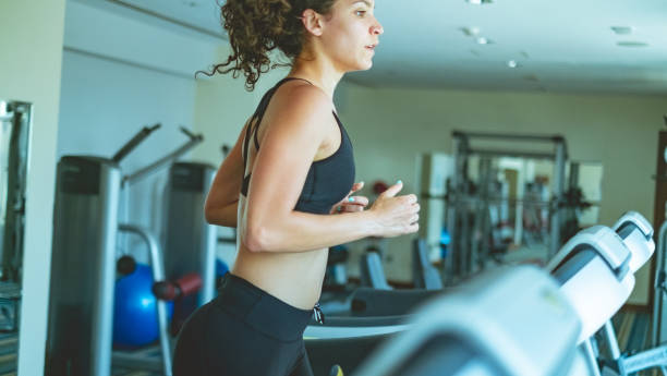 istock Woman on treadmill 970765740