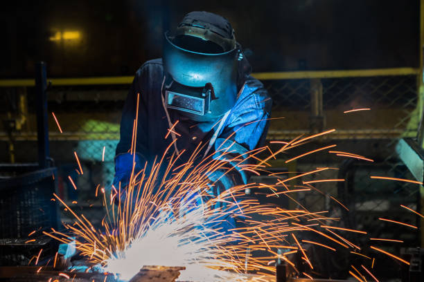 istock welder is working on metal industry with body protections 970771782