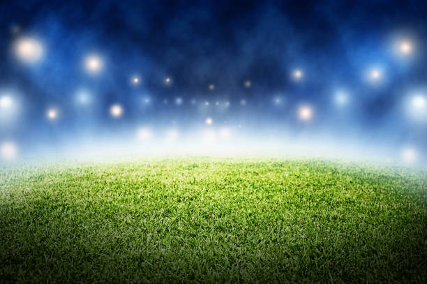 istock soccer field stadium in night time background 970775130