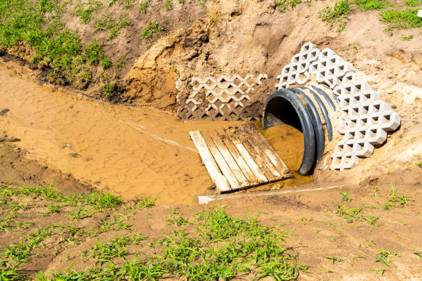 istock Pipe draining the water on the field 970775642