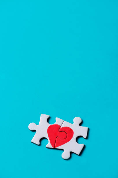 istock pieces of a puzzle forming a heart 970781554