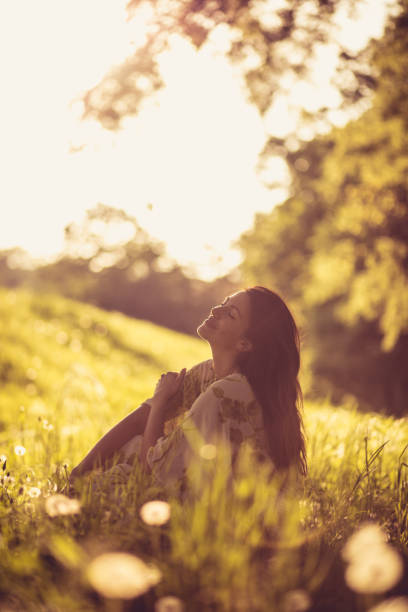 istock Enjoy in spring season. Young woman. 970781630