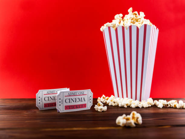 istock Popcorn With Two Red Movie Tickets 970784322