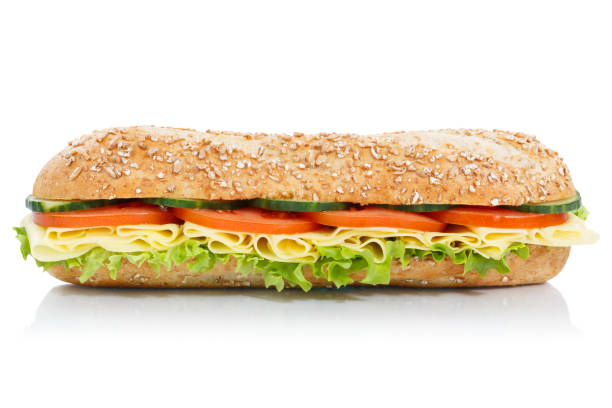 istock Sub sandwich whole grain grains baguette with cheese lateral isolated 970784650