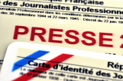 close-up of a press card