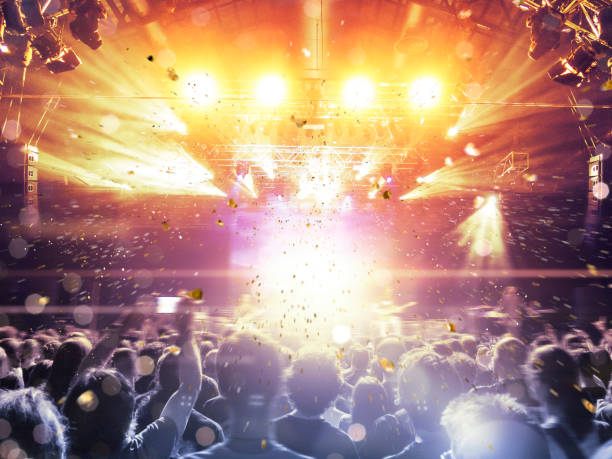 istock Concert hall with a big stage and many fans 970788664