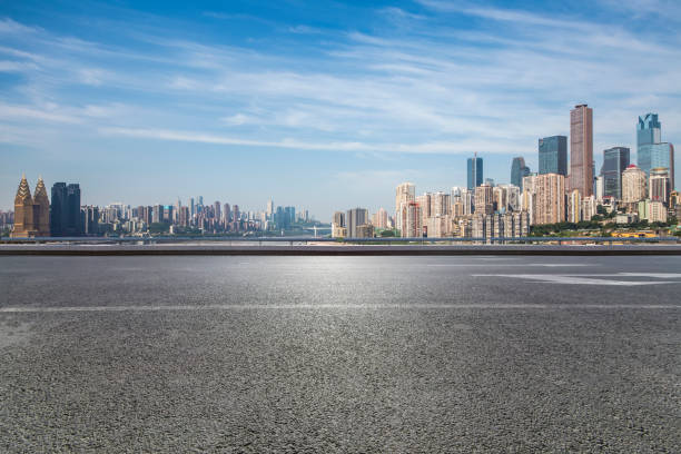 istock Panoramic skyline and modern business office buildings with empty road,empty concrete square floor 970789272