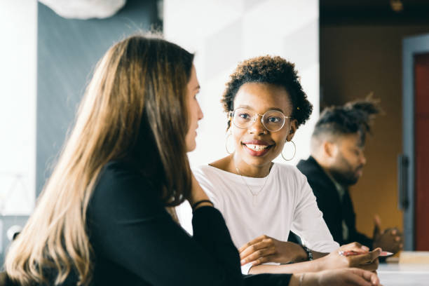 istock young women are talking in a meeting room 970792190