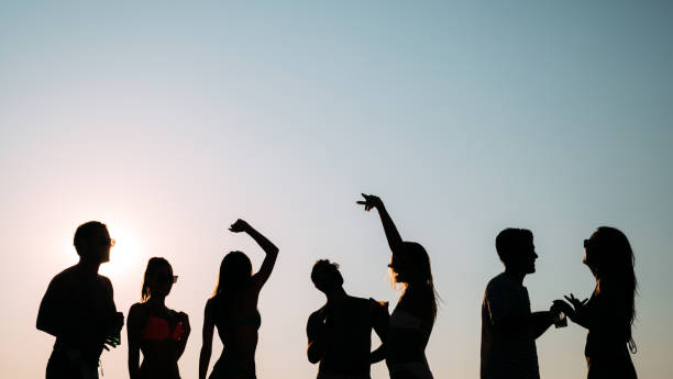 istock Friends partying during summer vacation 970799832