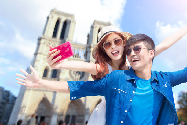 istock couple travel to paris 970802190