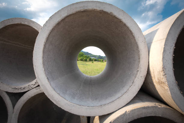 Concrete water pipe on the ground stock photo