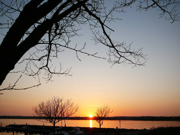 istock Sun setting over water in Danish village 970809602