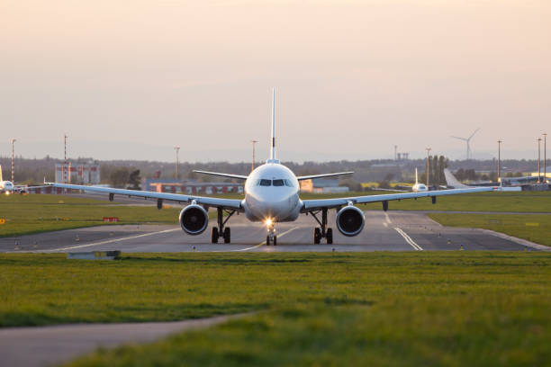 istock Commercial airplane flying above clouds 970810084