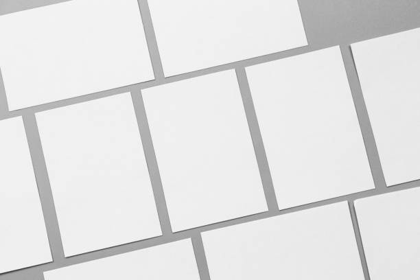 istock Blank portrait mock-up paper. brochure magazine isolated on gray, changeable background / white paper isolated on gray 970815876