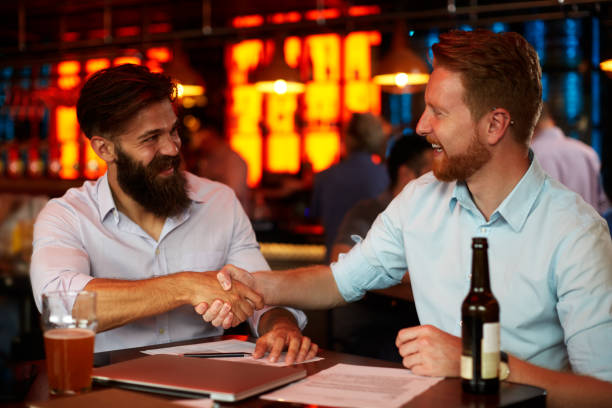 istock Business people in the bar 970816466