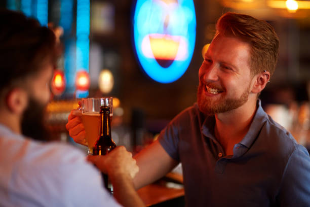 istock Male friends in the pub 970816508