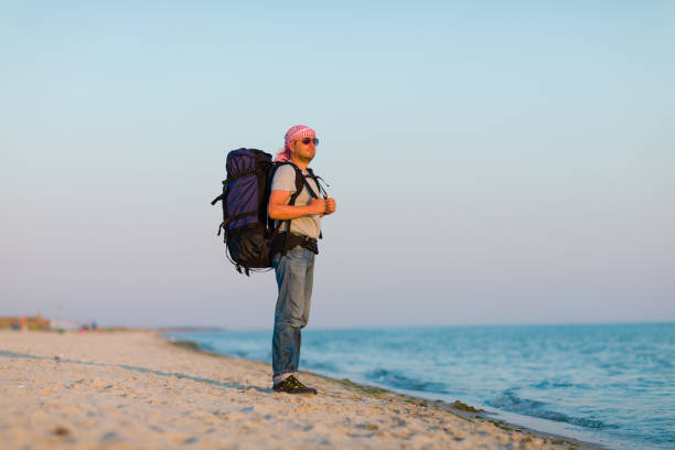 istock A backpacker standing on the beach of the Black Sea in summer 970819062
